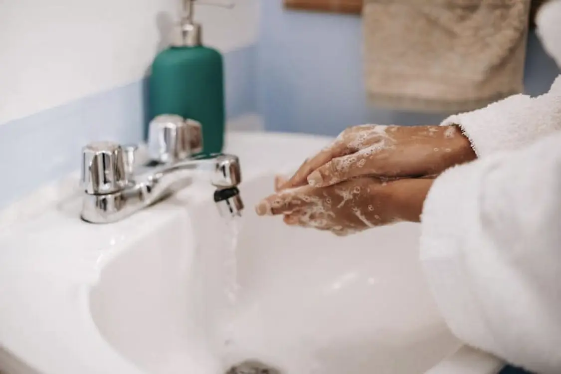 woman with ocd washing hands